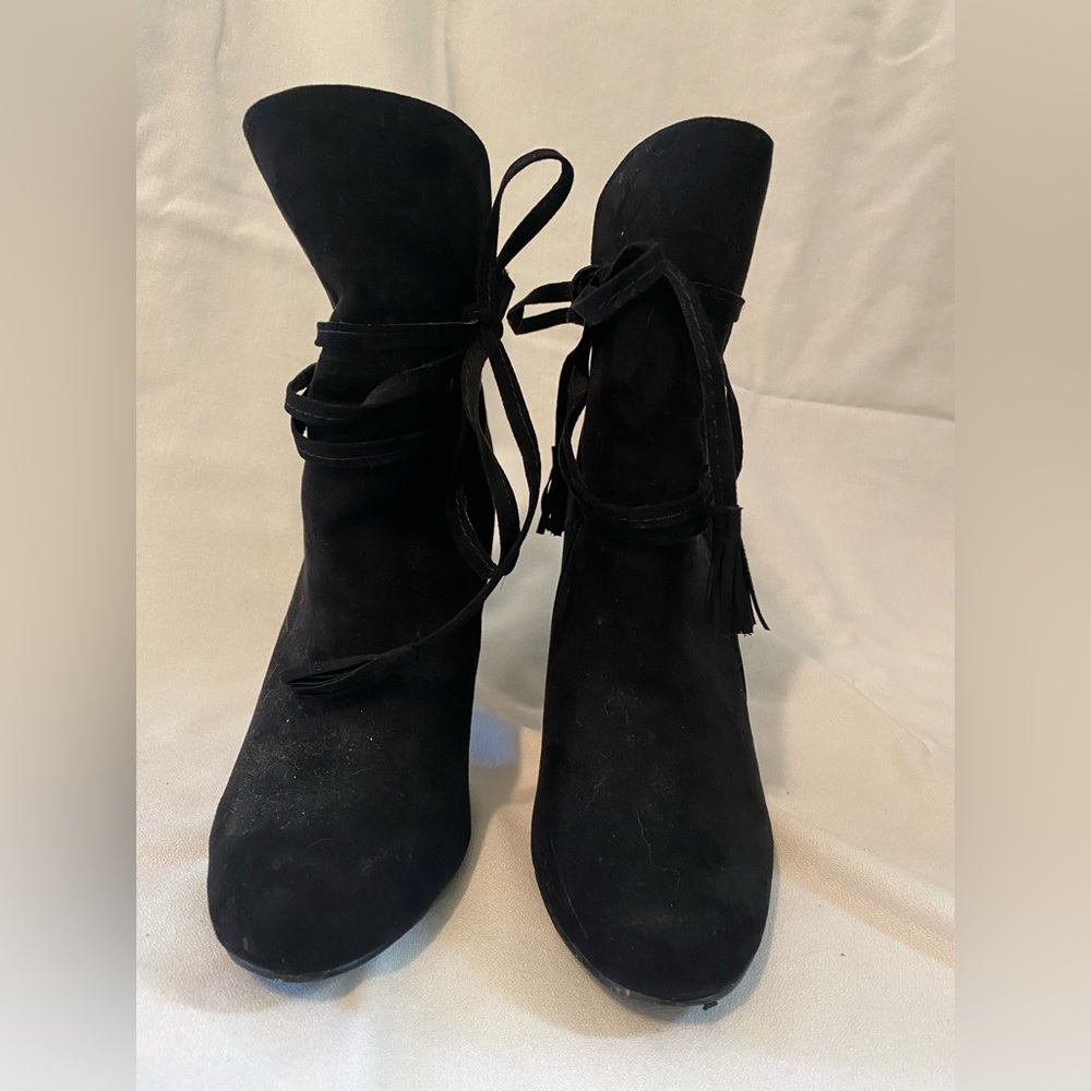 Black suede boots. Ties to add flare and functionality.